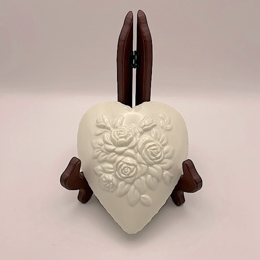 Heart shaped, ceramic, 5.5” wall sconce with floral design. Perfect for a gift!